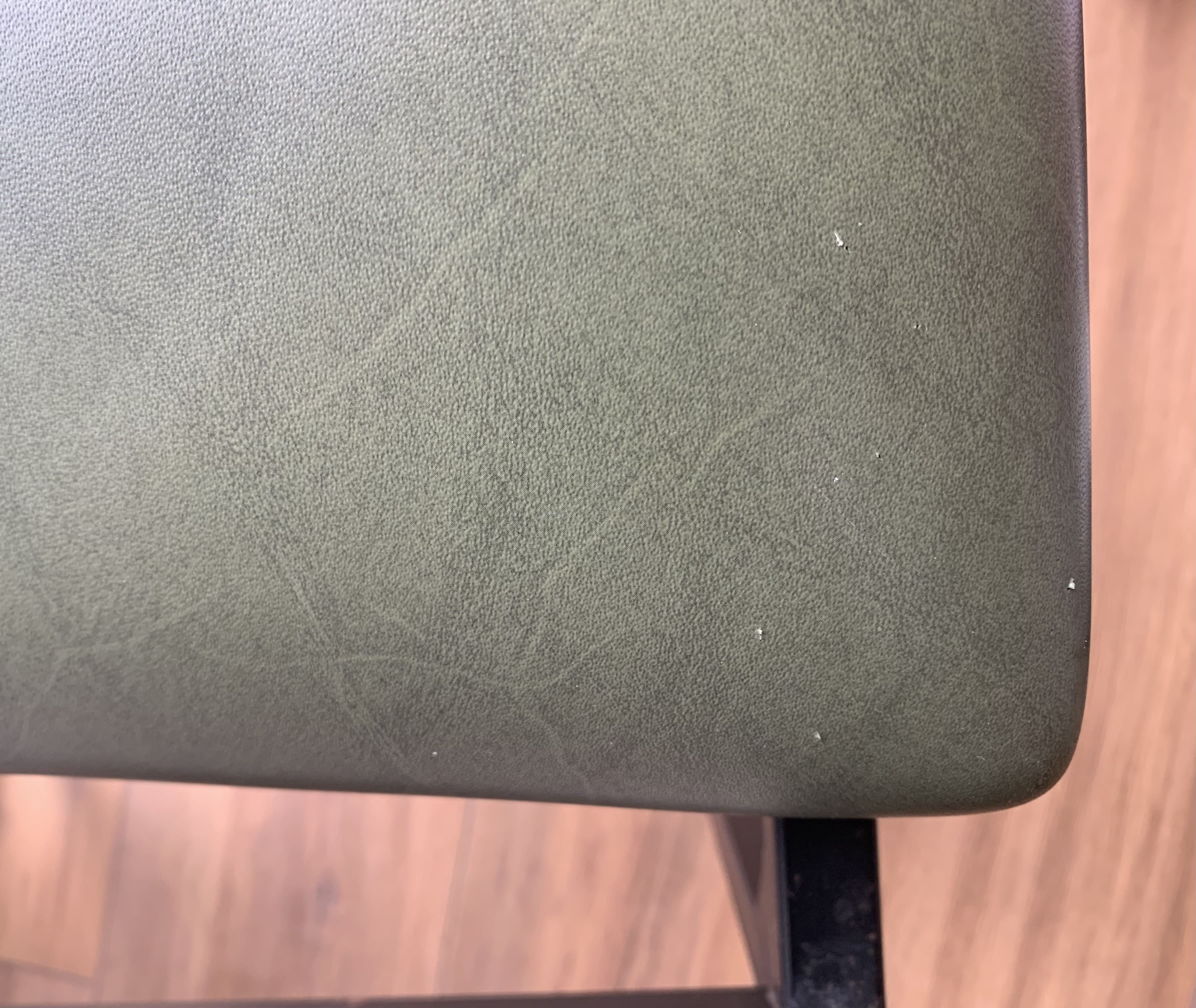 green and metal skai chair