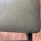 green and metal skai chair