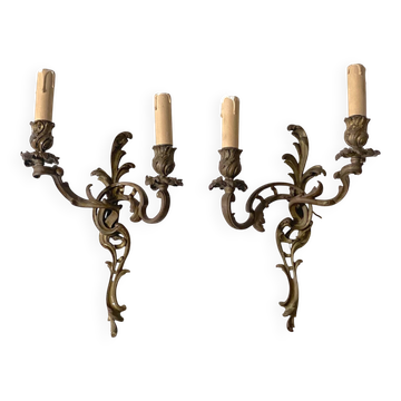 Pair of bronze wall sconces in Louis XV style