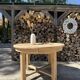 Round solid oak table with extensions, maximum 220cm.