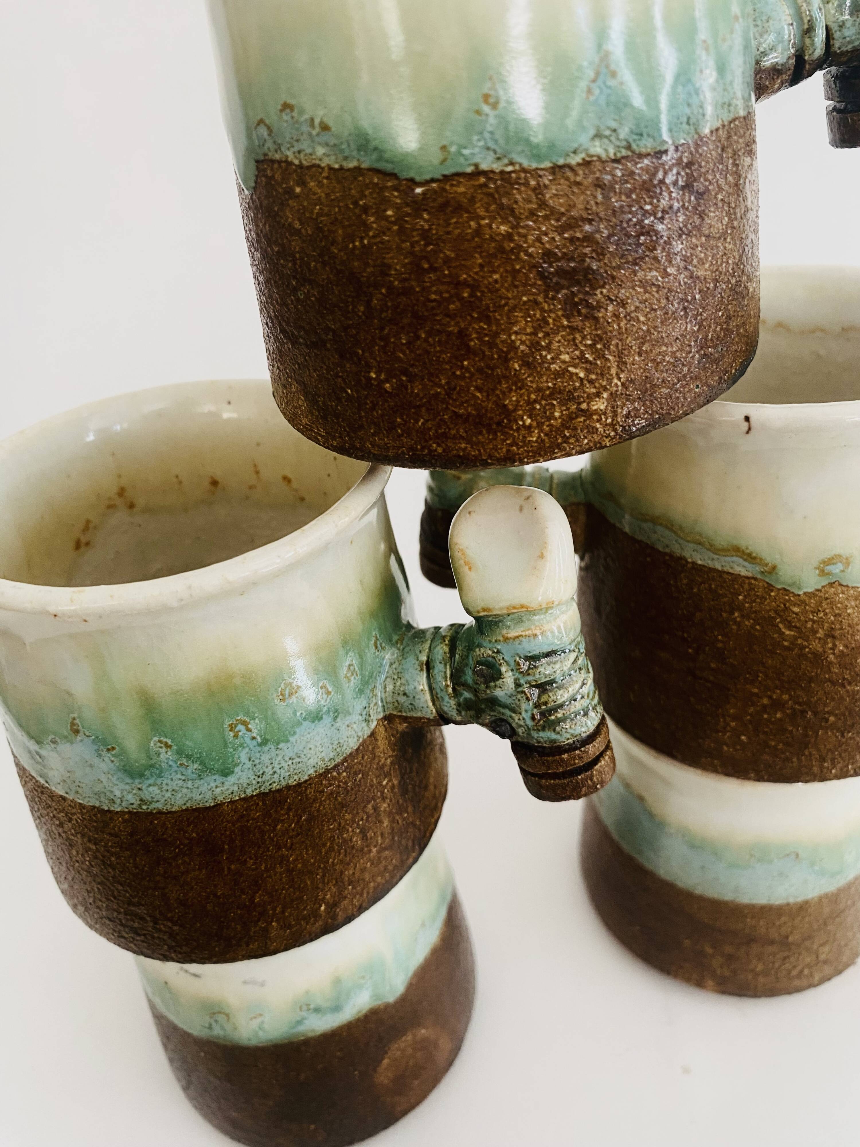 5 glazed and scarified ceramic cups