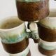 5 glazed and scarified ceramic cups