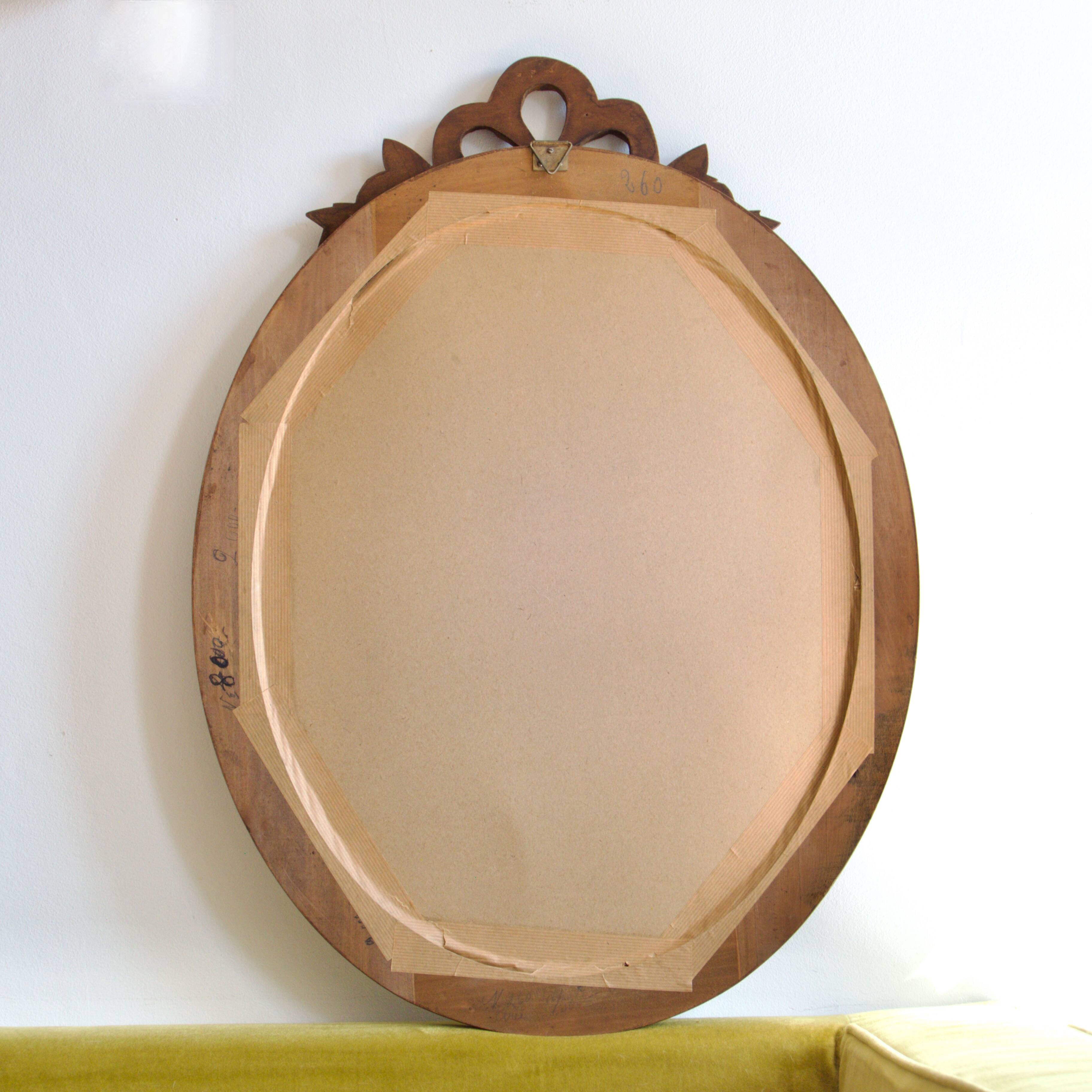 Gustavian knot hand carved oval wooden mirror