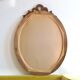 Gustavian knot hand carved oval wooden mirror