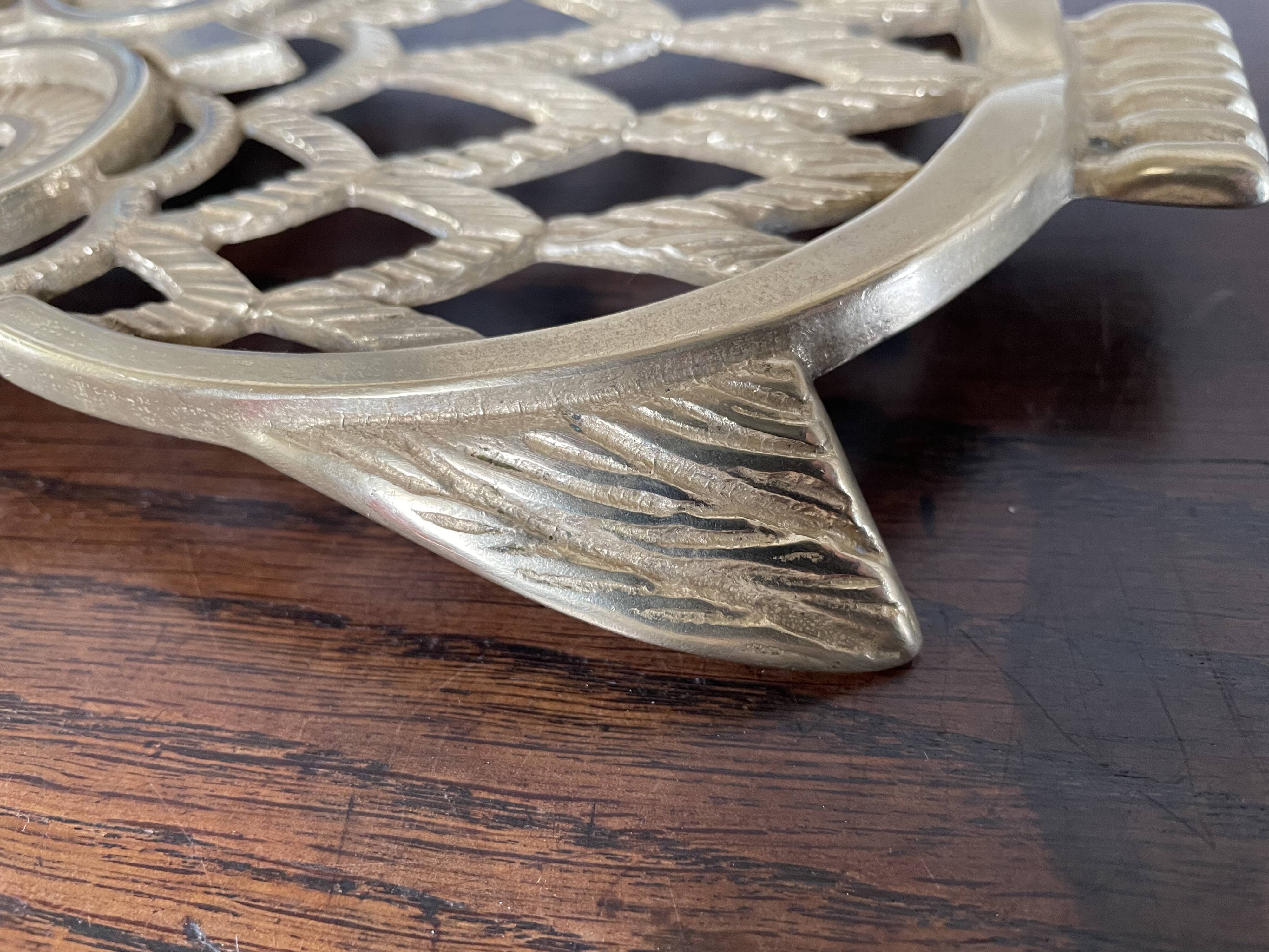 Owl trivet in golden brass