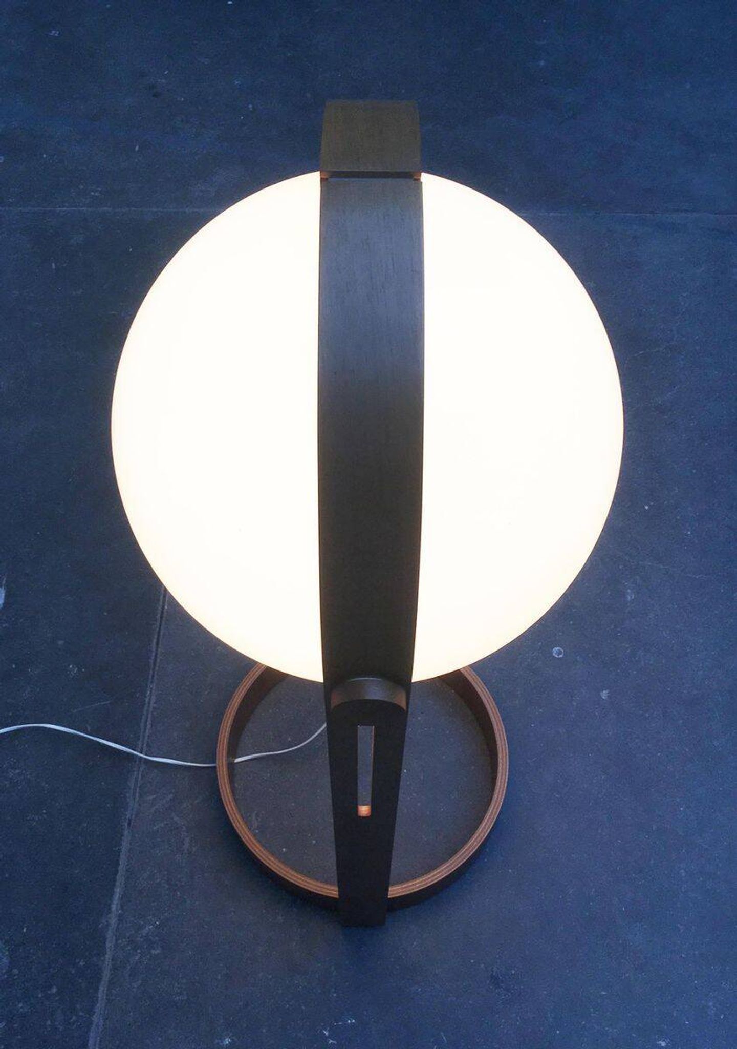 Swiss space-style floor lamp made of plastic and plywood from the 1960s.
