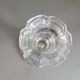 Old candlestick with molded glass stamps