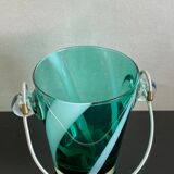 Bucket with ice cubes colored green glass