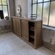 Large row of solid oak loom sliding doors