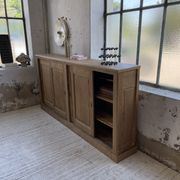Large row of solid oak loom sliding doors
