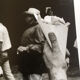 Photograph.woman with hat at funfair, 90s