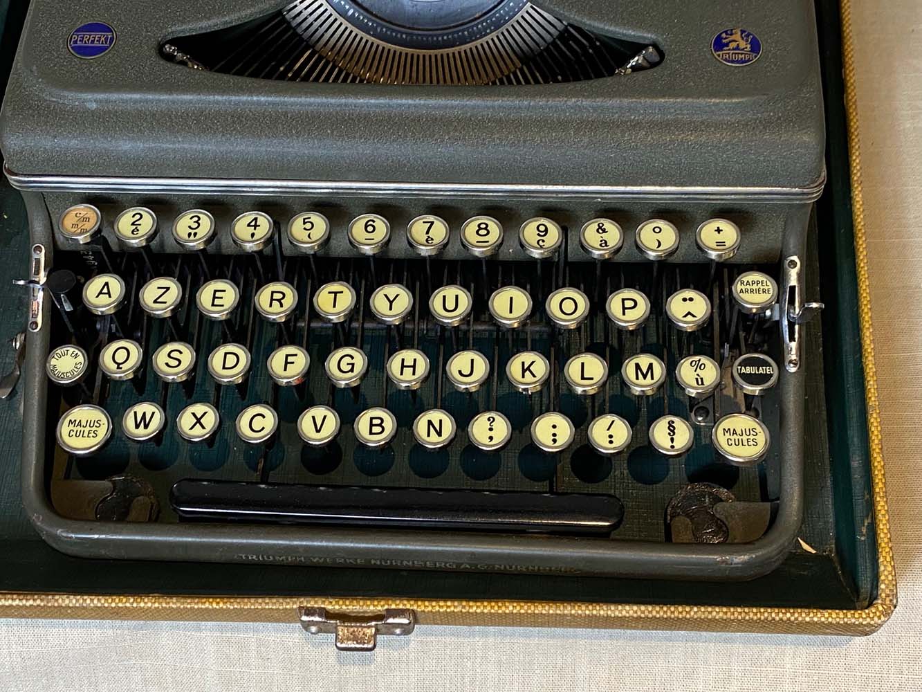 Triumph perfekt typewriter with its transport box.