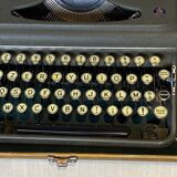 Triumph perfekt typewriter with its transport box.