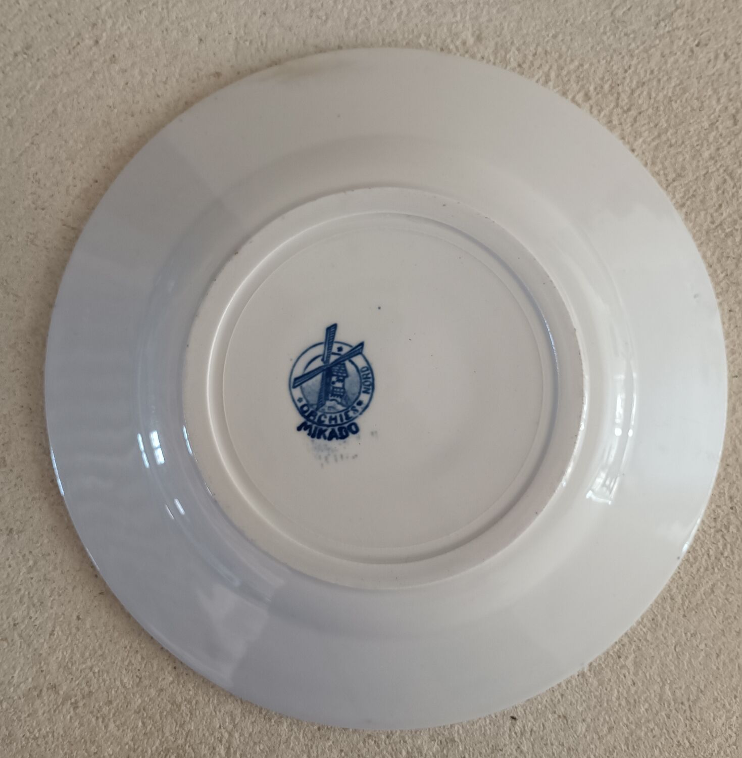 2 mismatched ironstone plates