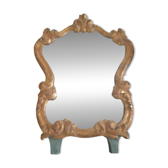 Miroir XIX e au mercure. Entourage bois doré à l'or fin.