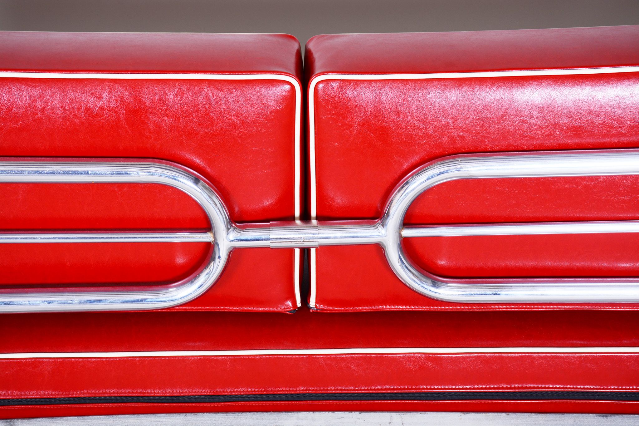 Red leather sofa by Hynekk Gottwald 1930