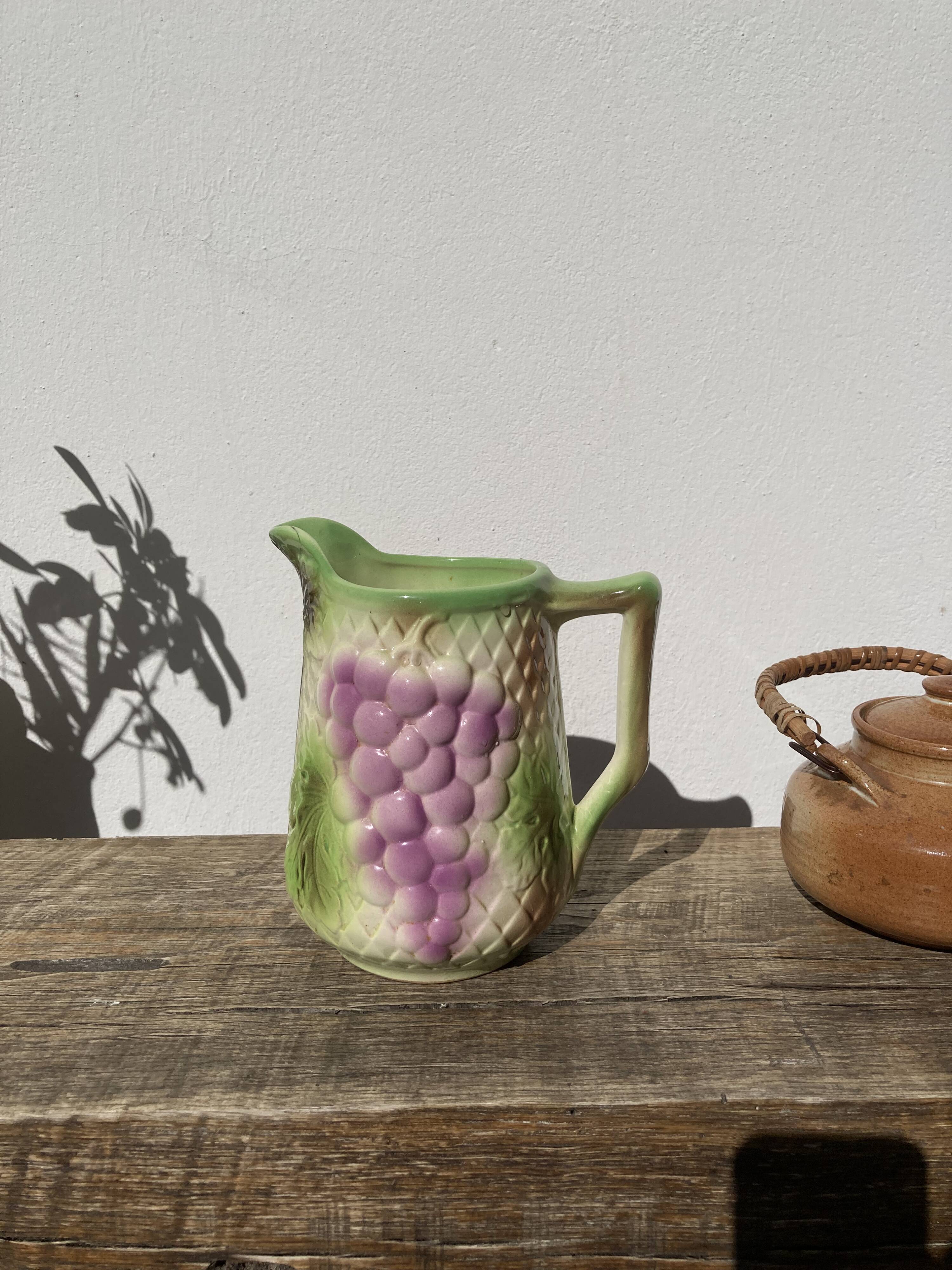 Pitcher in slip - earthenware Saint Clement numbered with fruit and grape basket decoration