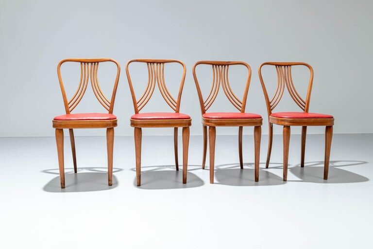 Set of 4 dining chairs in blond wood and faux leather red Italy 1950s