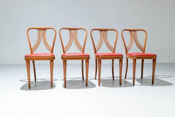 Set de 4 chaises de salle à manger en bois blond et faux cuir rouge Italie années 1950