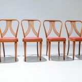 Set of 4 dining chairs in blond wood and faux leather red Italy 1950s