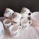 Coffee pot and forget-me-not cups