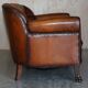 Victorian Chesterfield leather canapé with oak lion claw feet.