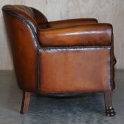Victorian Chesterfield leather canapé with oak lion claw feet.