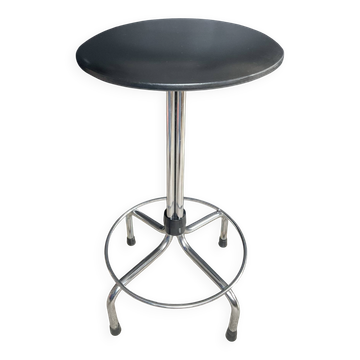Vintage tubular chrome stool with black faux leather.