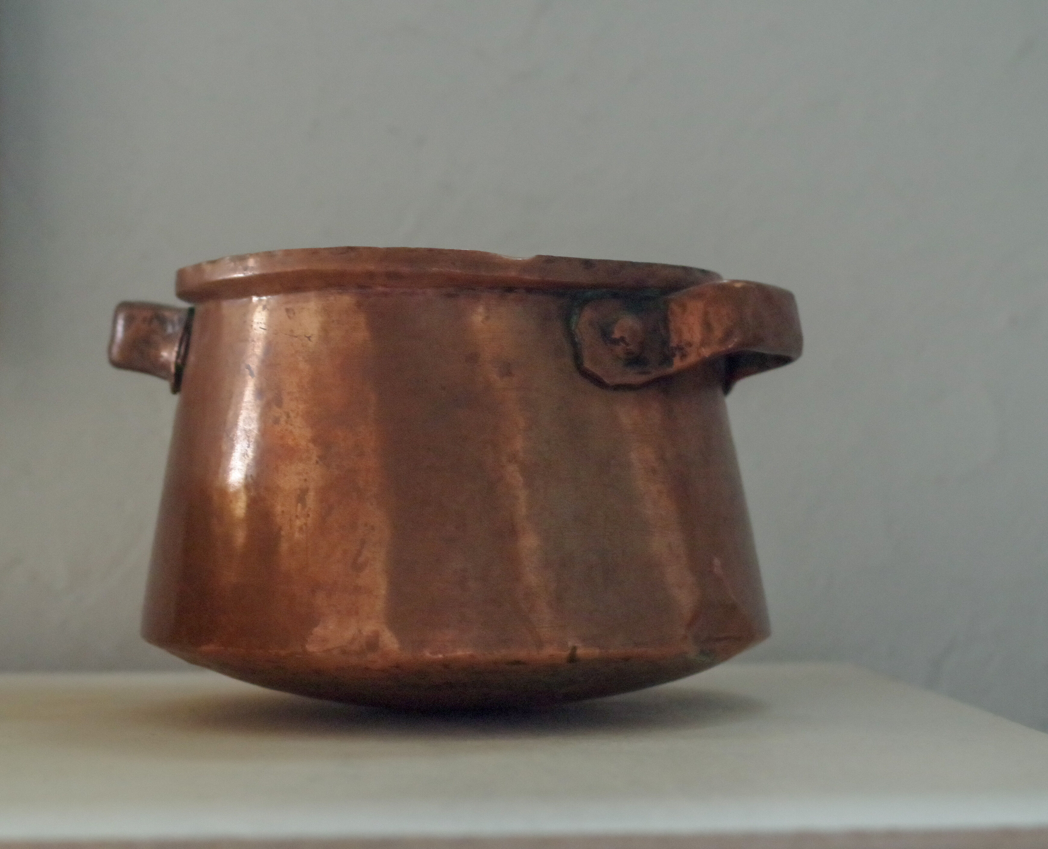 Old copper pot cover