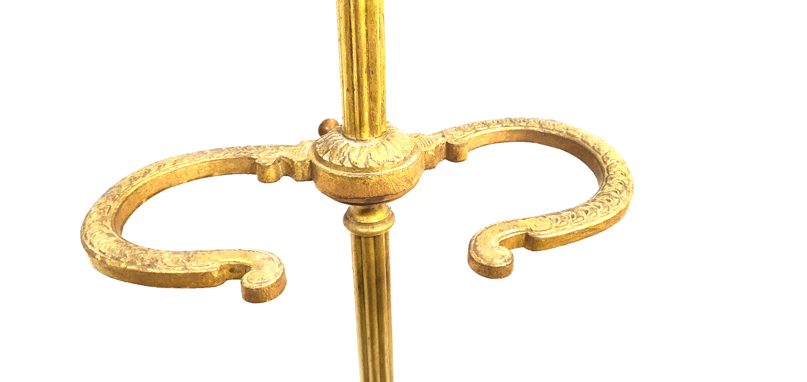 Old brass umbrella door triangular base mounted on column