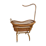 Rattan cradle on wheels
