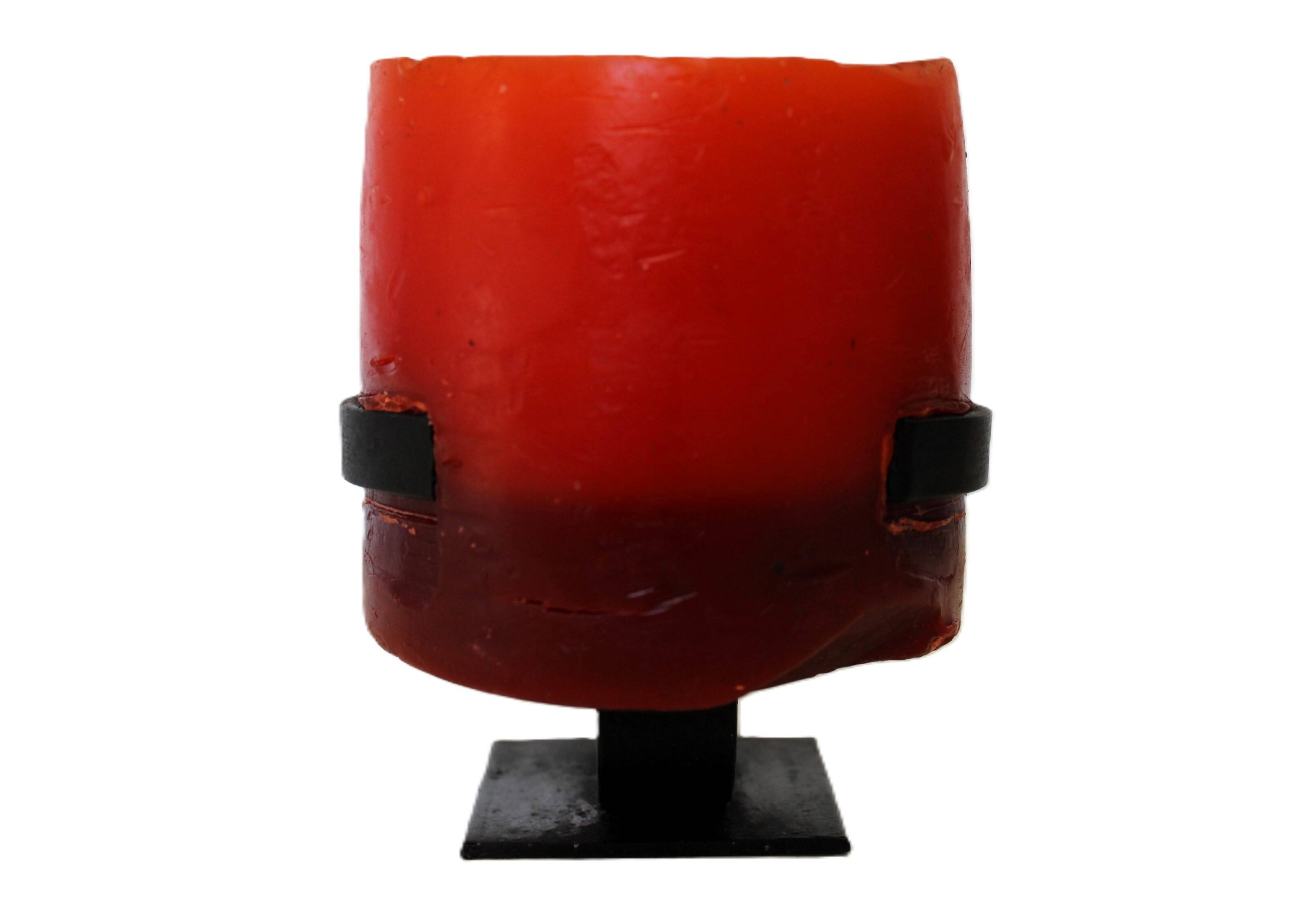 1970 wrought iron candlestick with its period coloured candle.
