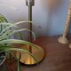 Mid-century gold metal table lamp with white striped shade
