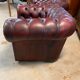 Paire de fauteuils chesterfield cuir