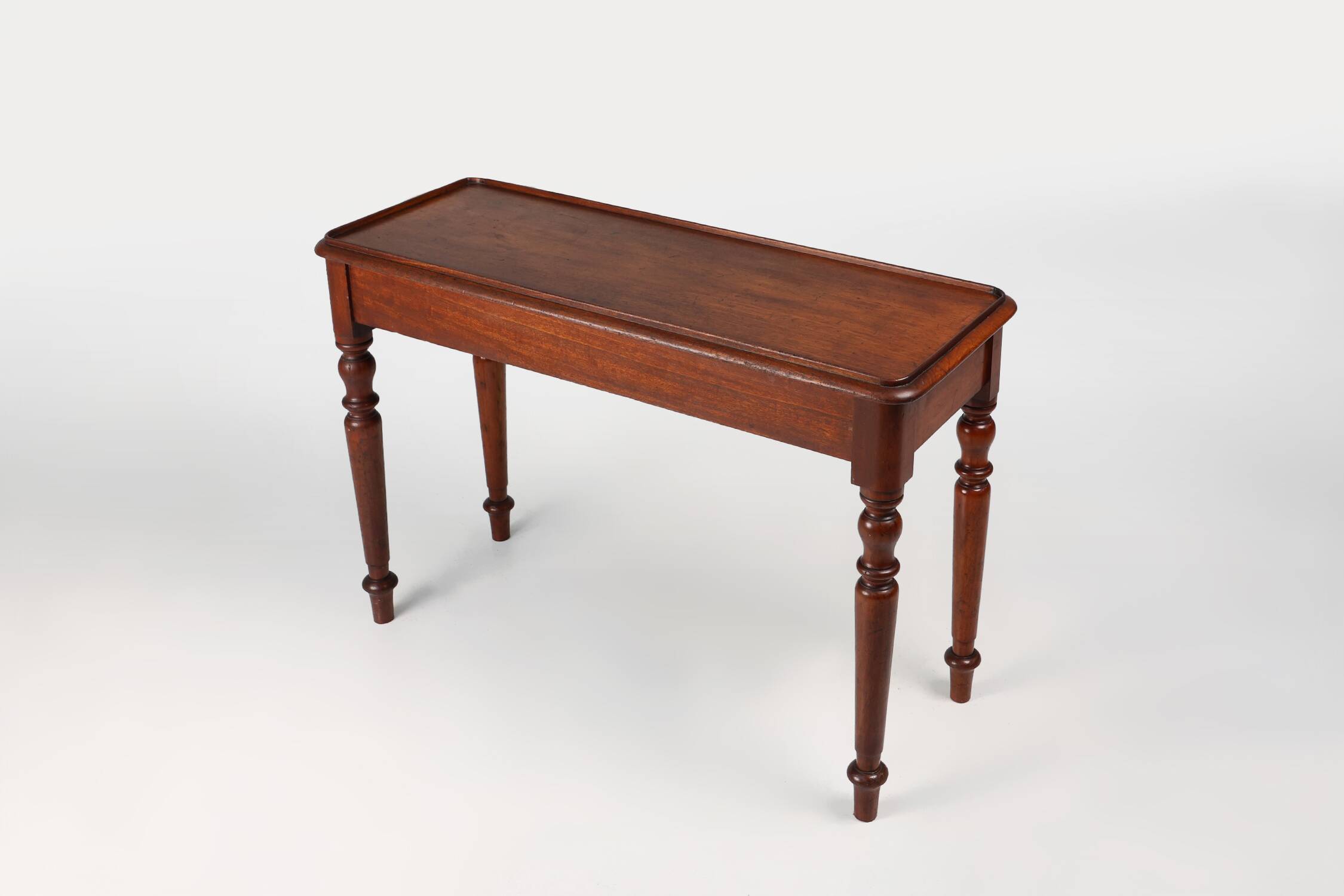 Elegant Mid 19th century English side table in full wood
