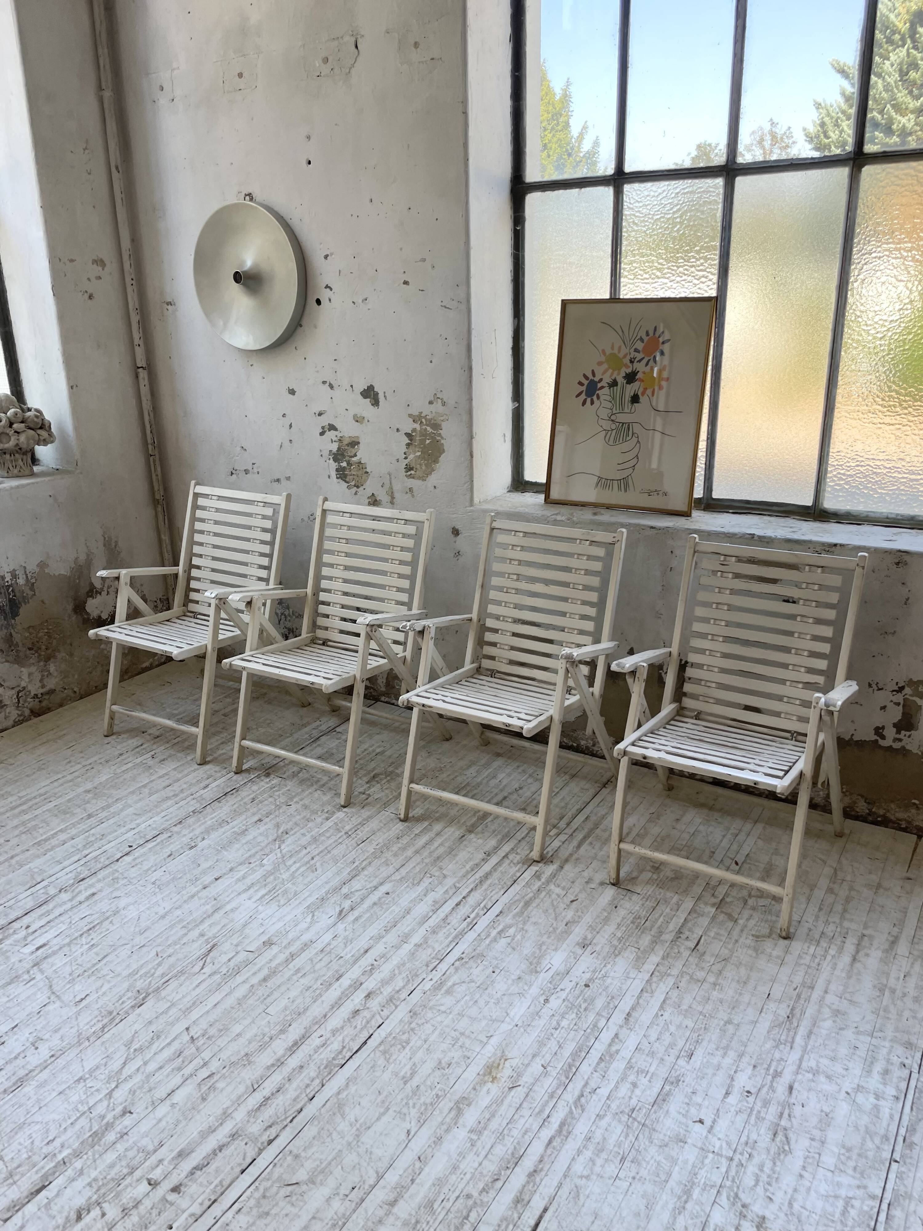 4 white wooden garden chairs