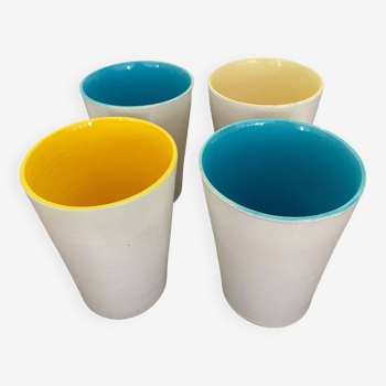 Tumblers, vintage glasses in white ceramic Aegitna Vallauris blue or yellow enameled interior