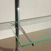 Glass and chrome metal shelf, store display