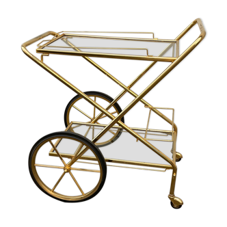 Rolling service table in gilded metal