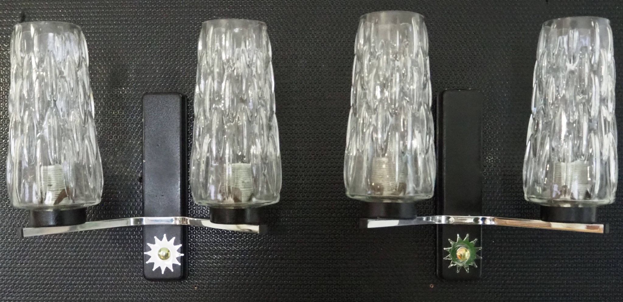 Pair of wall lights from the 1950s-1960s with a push button switch.