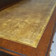 Old desk in cherry and green leather