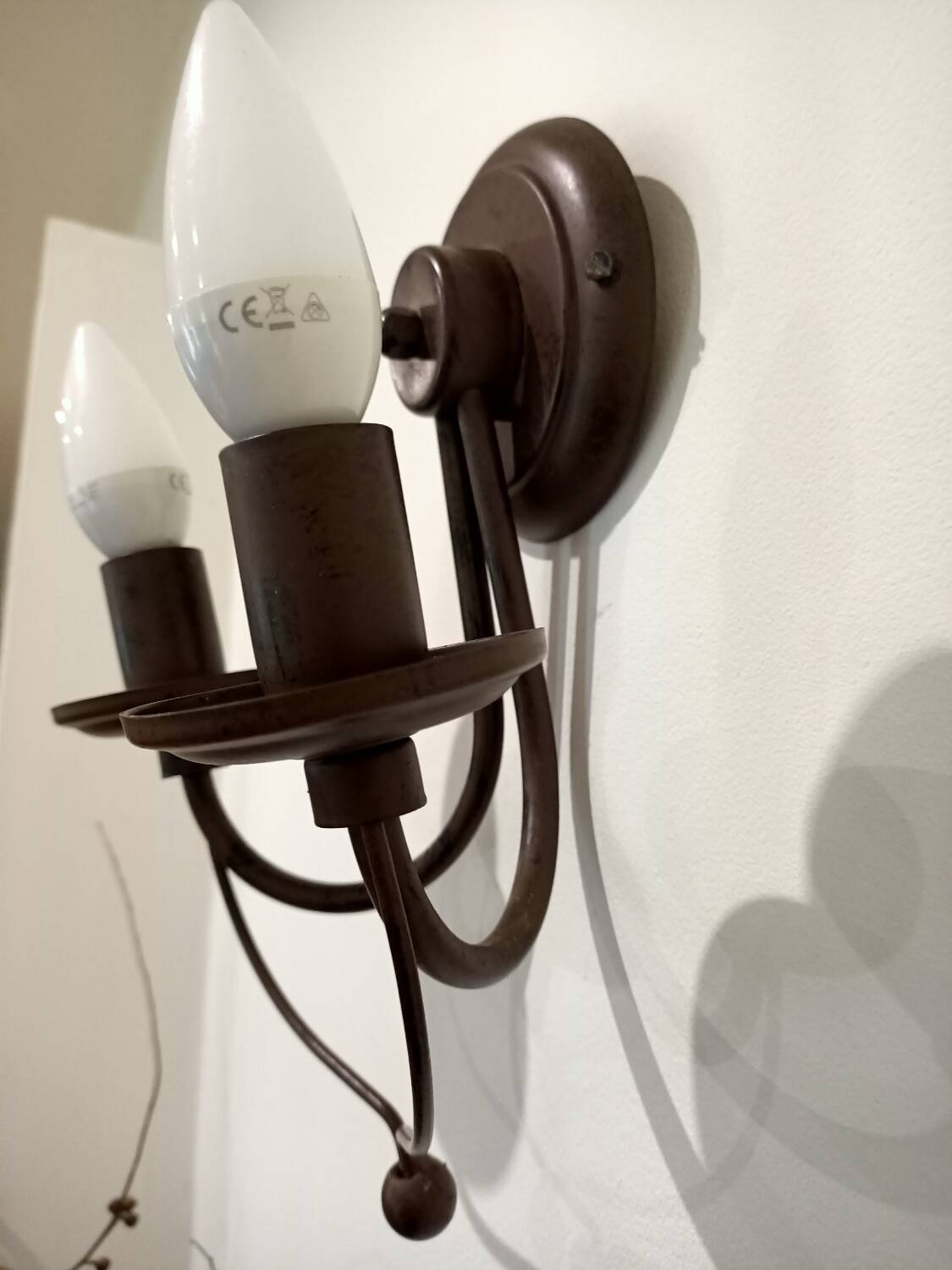 Pair of matte metal wall lights