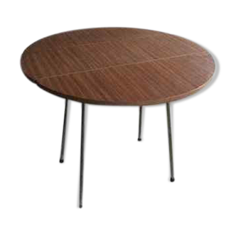 Brown round table in vintage formica