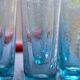Six Biot glass orange glasses