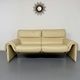 Two-seater designer sofa De Sede DS-2011 in cream leather with adjustable backrest.