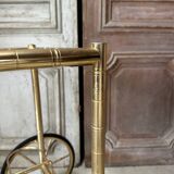 Vintage gold bar cart serving trolley