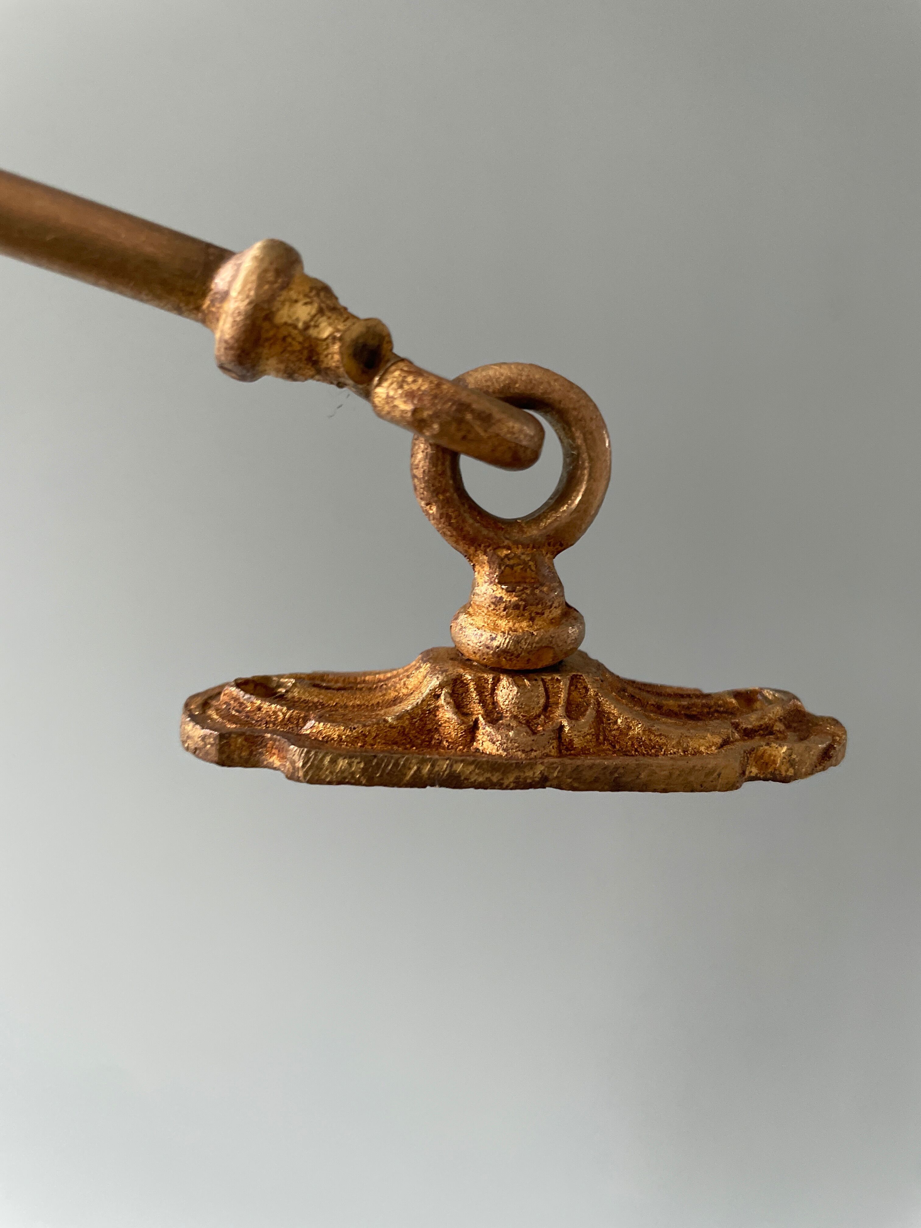 Pair of Napoleon III gilt bronze tiebacks