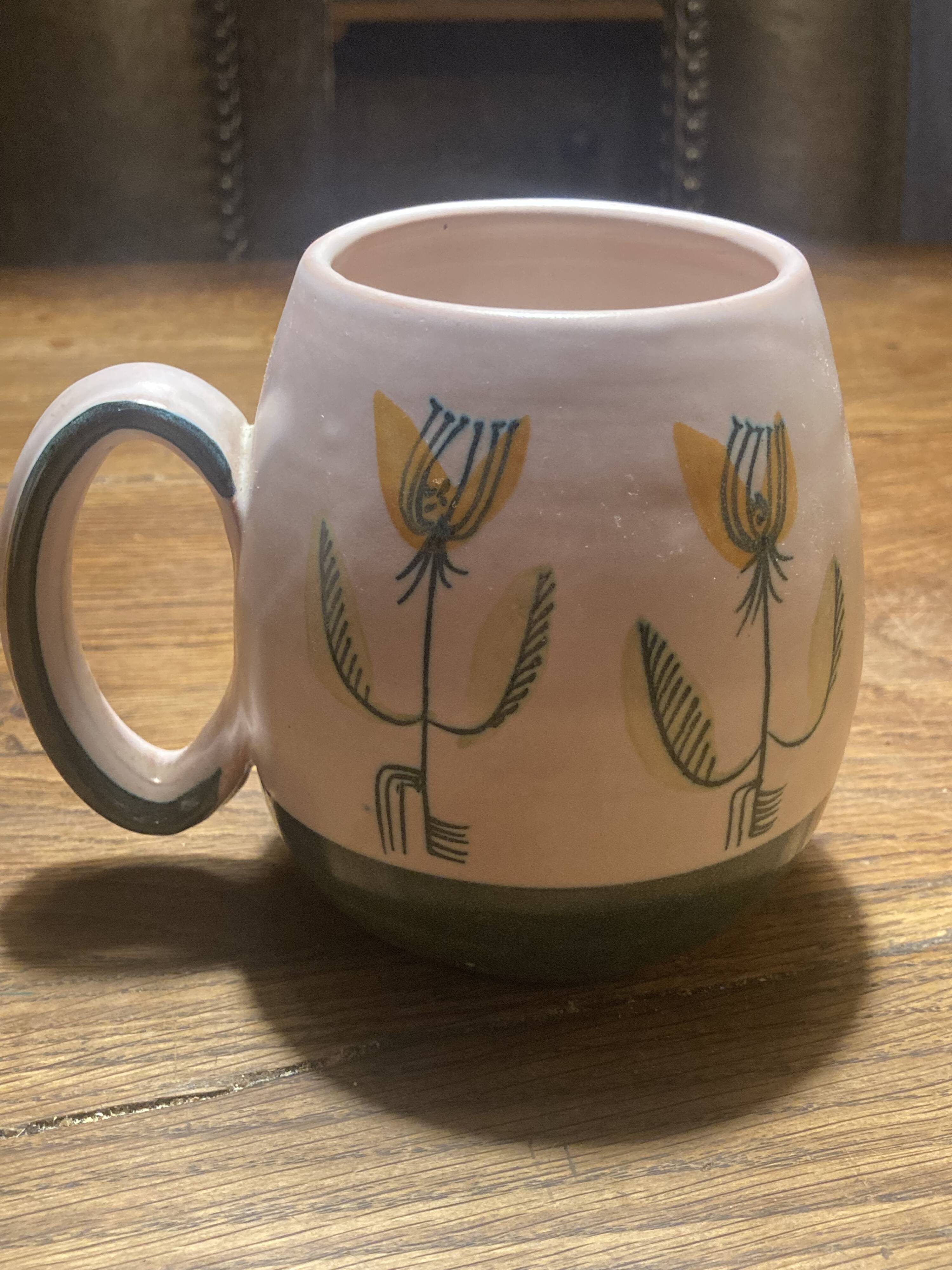 Set of two ceramic mugs signed Yvon ROY