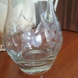 Pitcher decorating grape bunch