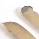 Two antique service knives in silver-plated metal, pearl frieze gowe alpacca.